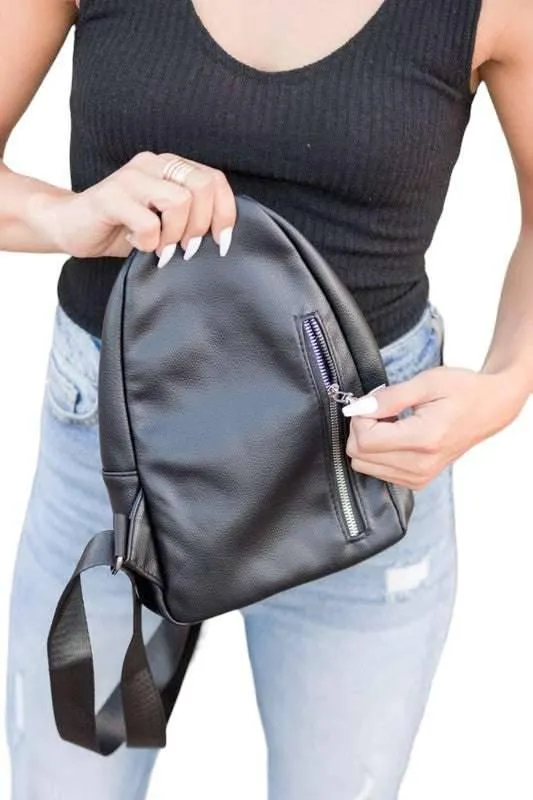 Black vegan leather sling bag