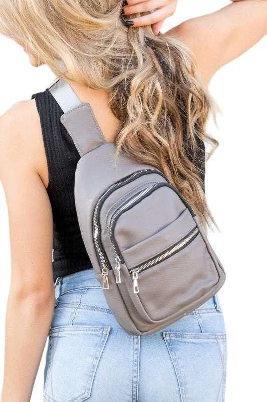 Black vegan leather sling bag